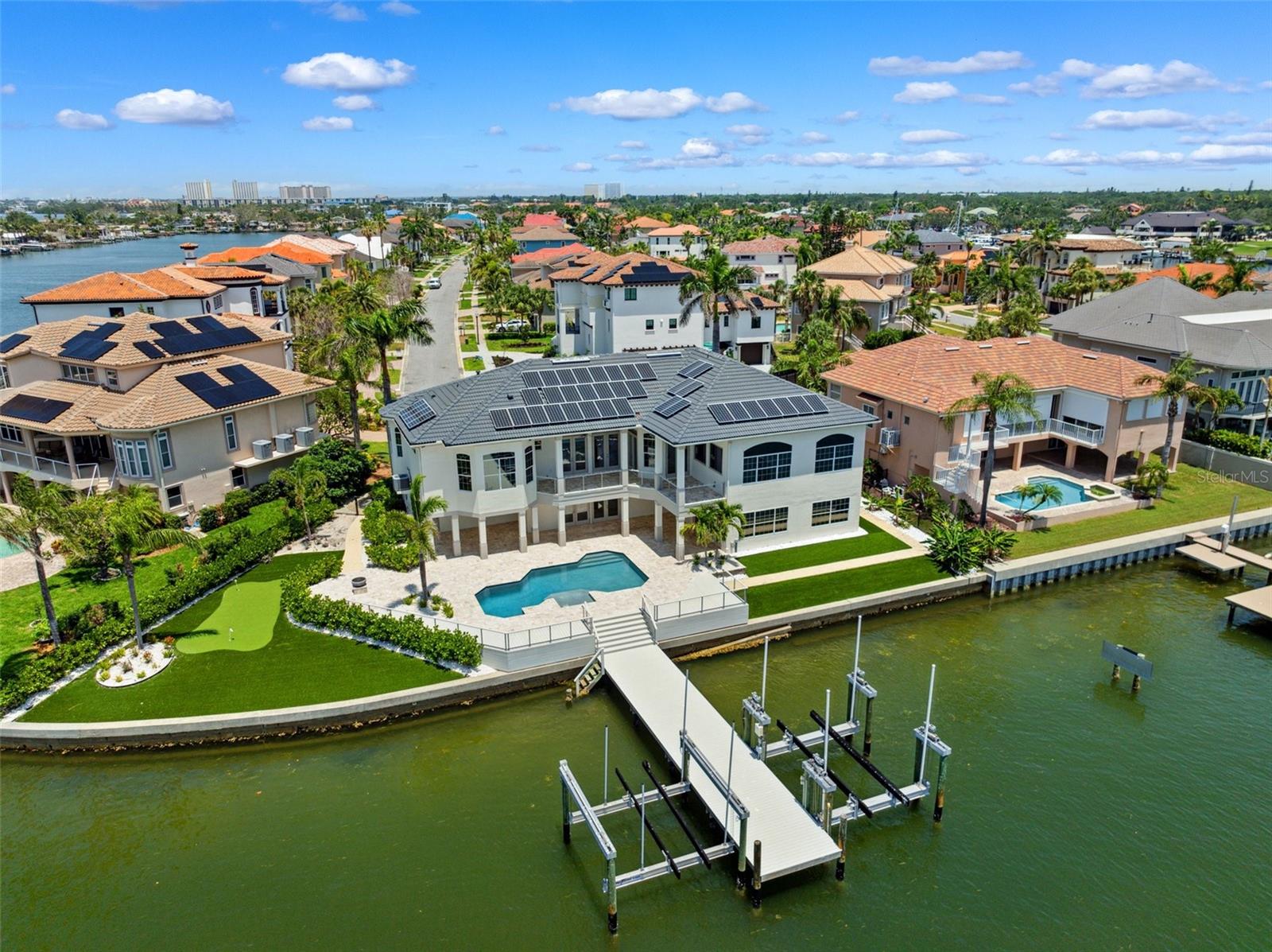 Welcome To Pasadena Yacht & Country Club! This stunning home offers 160ft of seawall and impressive outdoor entertaining spaces as well as a 50,000LB boat lift and 24,000lb Boat Lift!