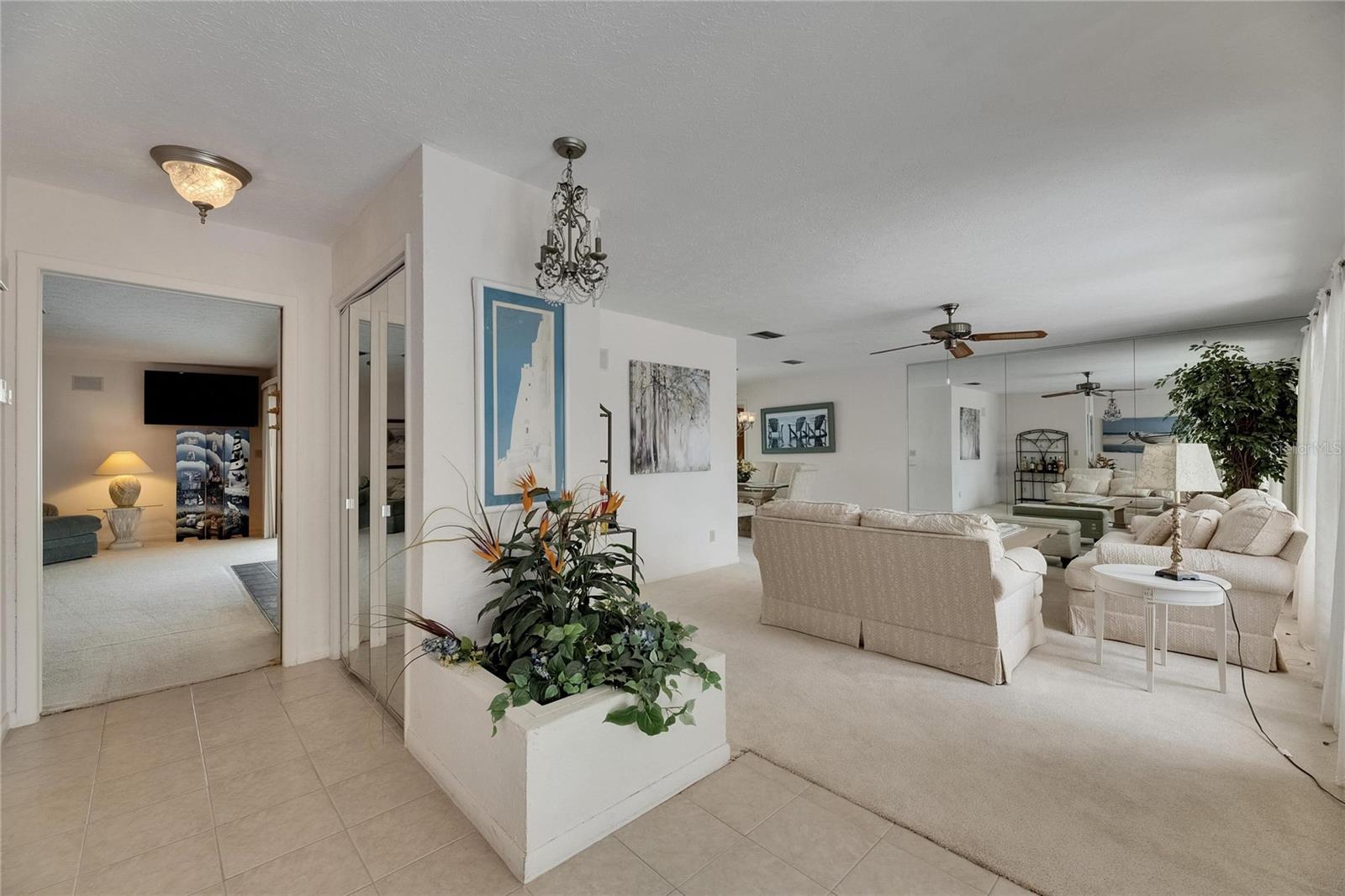View From Foyer: Family Room (L) & Formal Living Room (R)