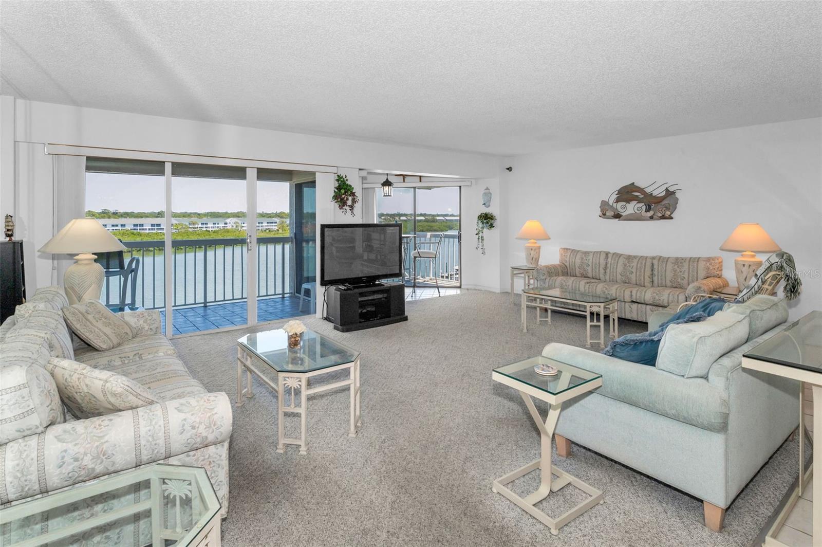 Extra Wide 22' x 23' Living Room with corner unit water views!