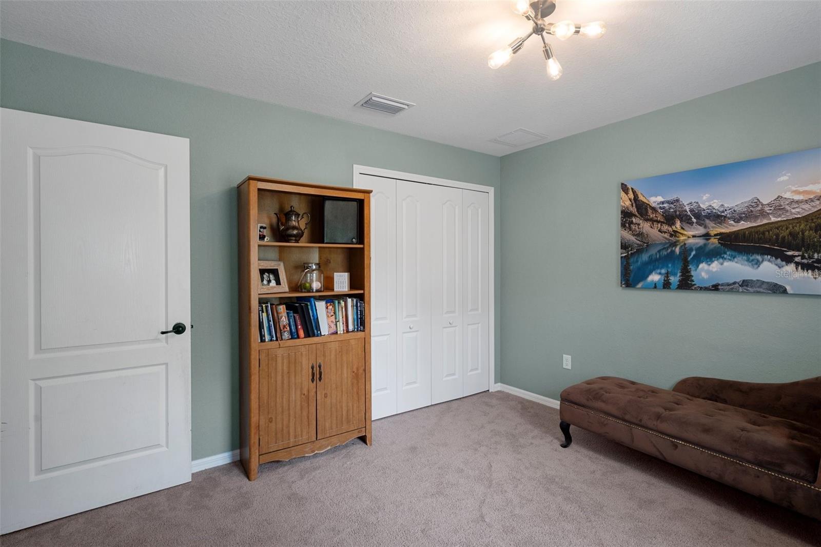This bedroom is currently being used as a den