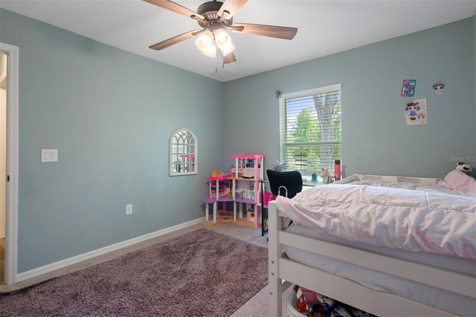 Bedroom two has a newer fan/light