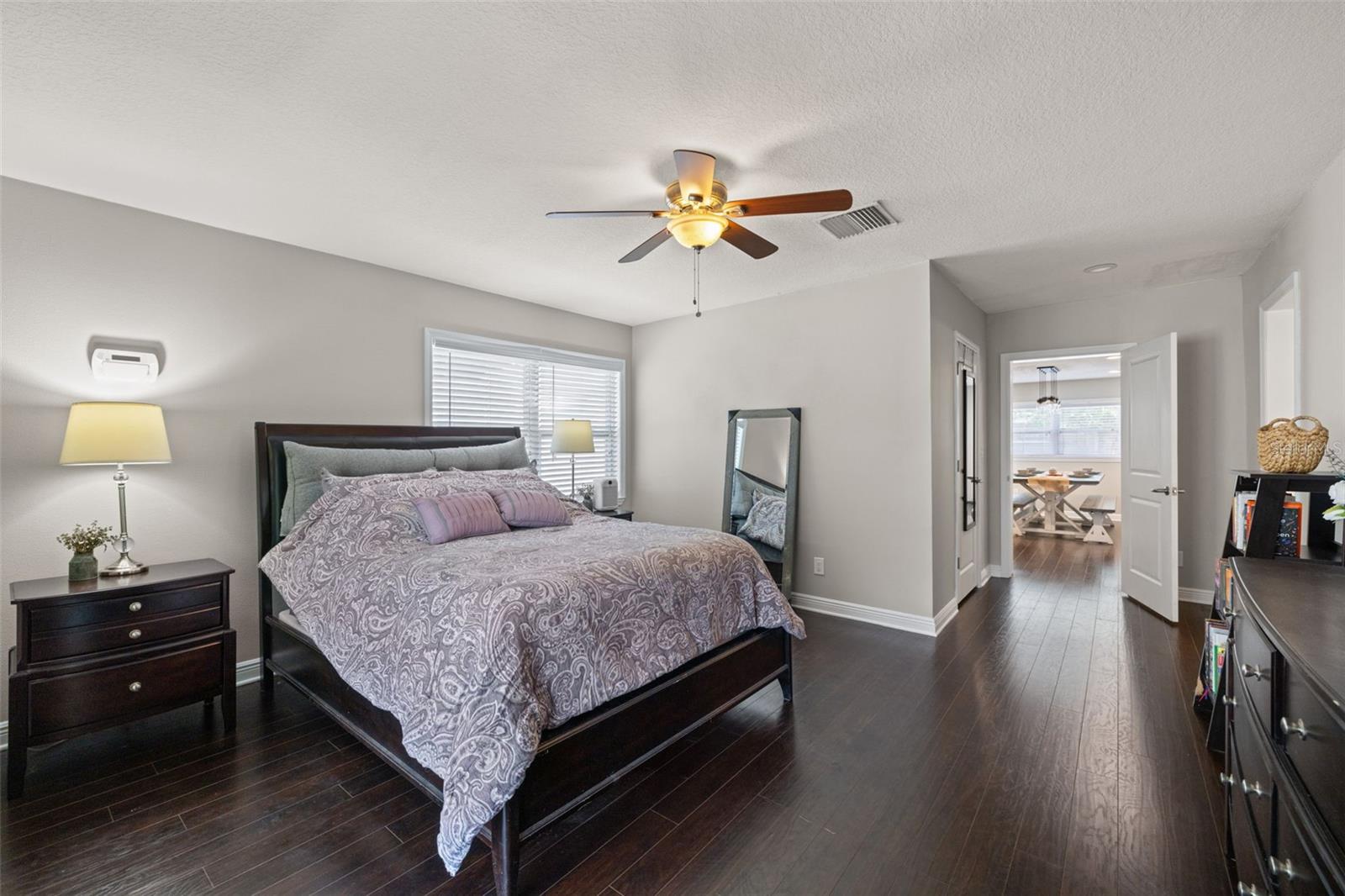 Primary / master bedroom with walk-in closet and bathroom