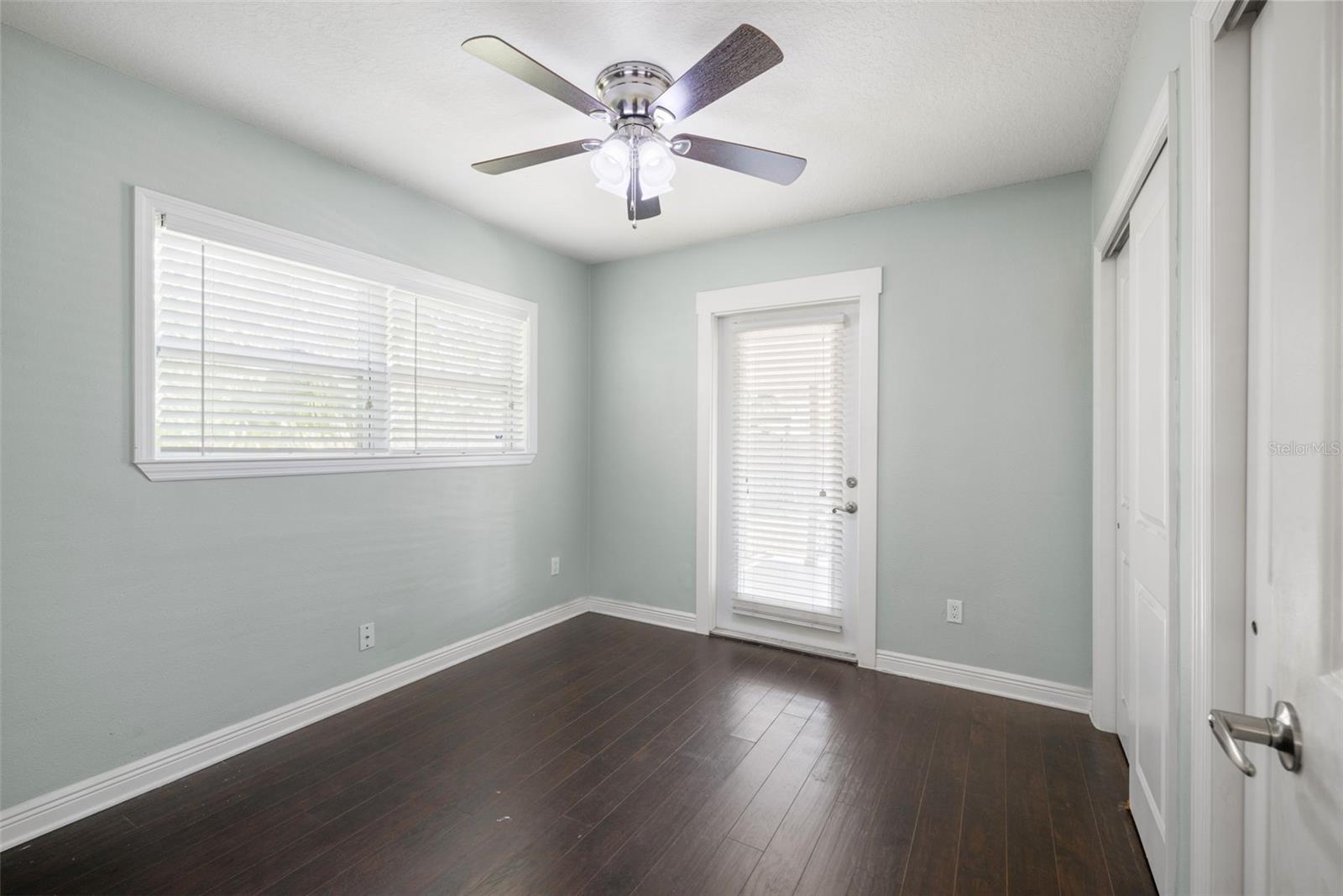 Bedroom with access to the back porch