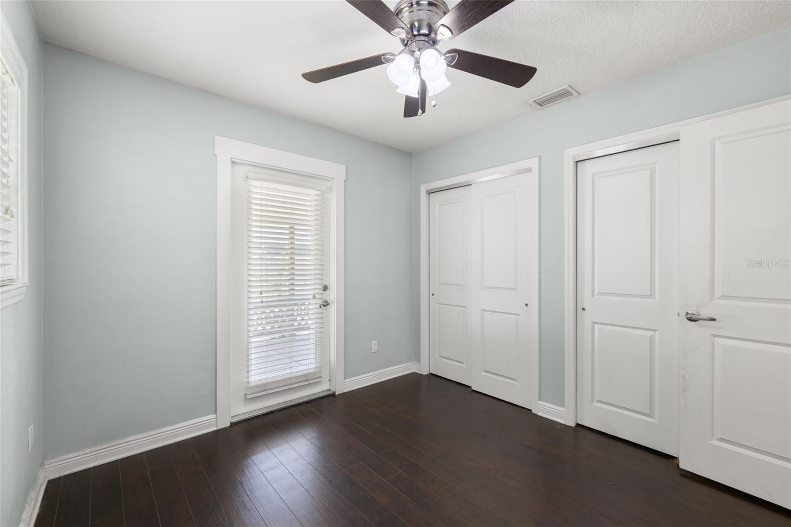 Bedroom with built in closet