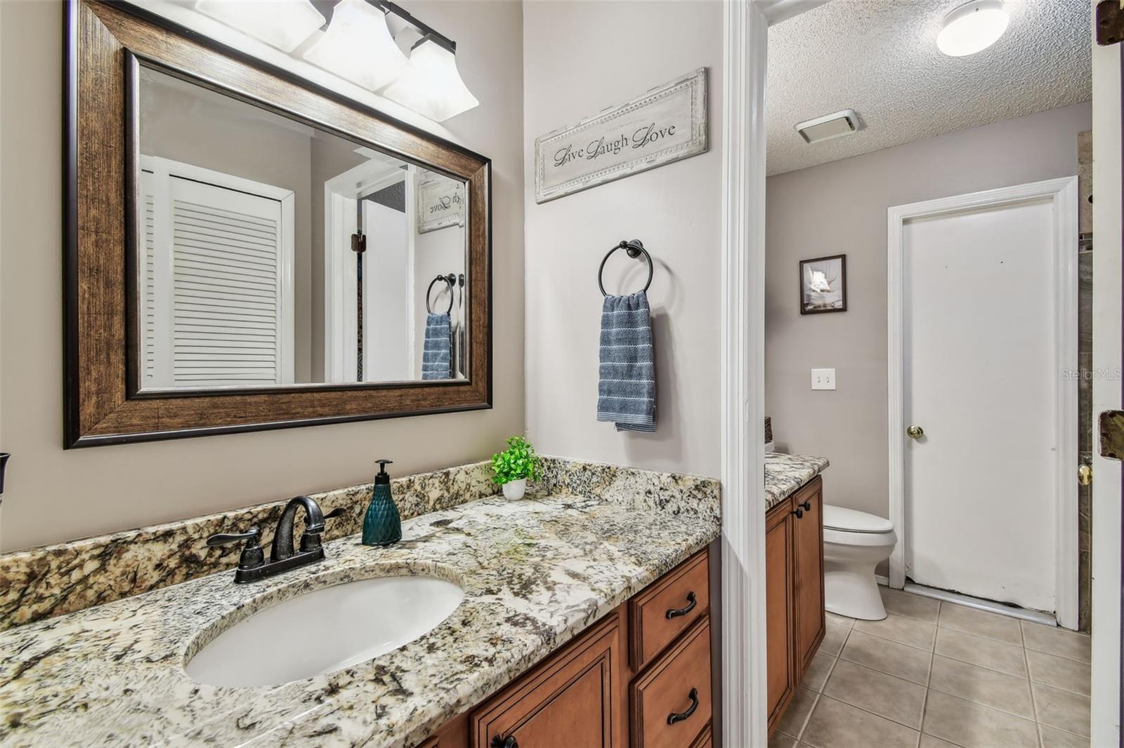 PARTIAL BATH CONNECTED TO POOL BATH