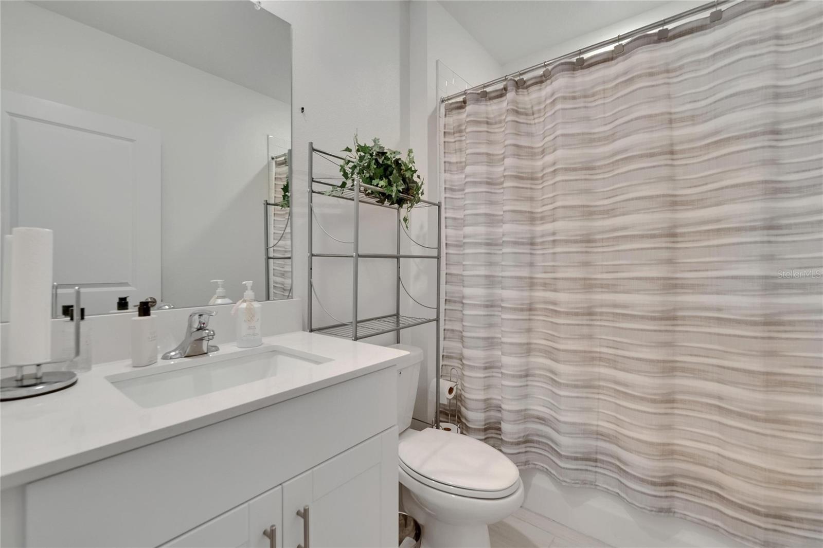 Main downstairs bathroom at entryway