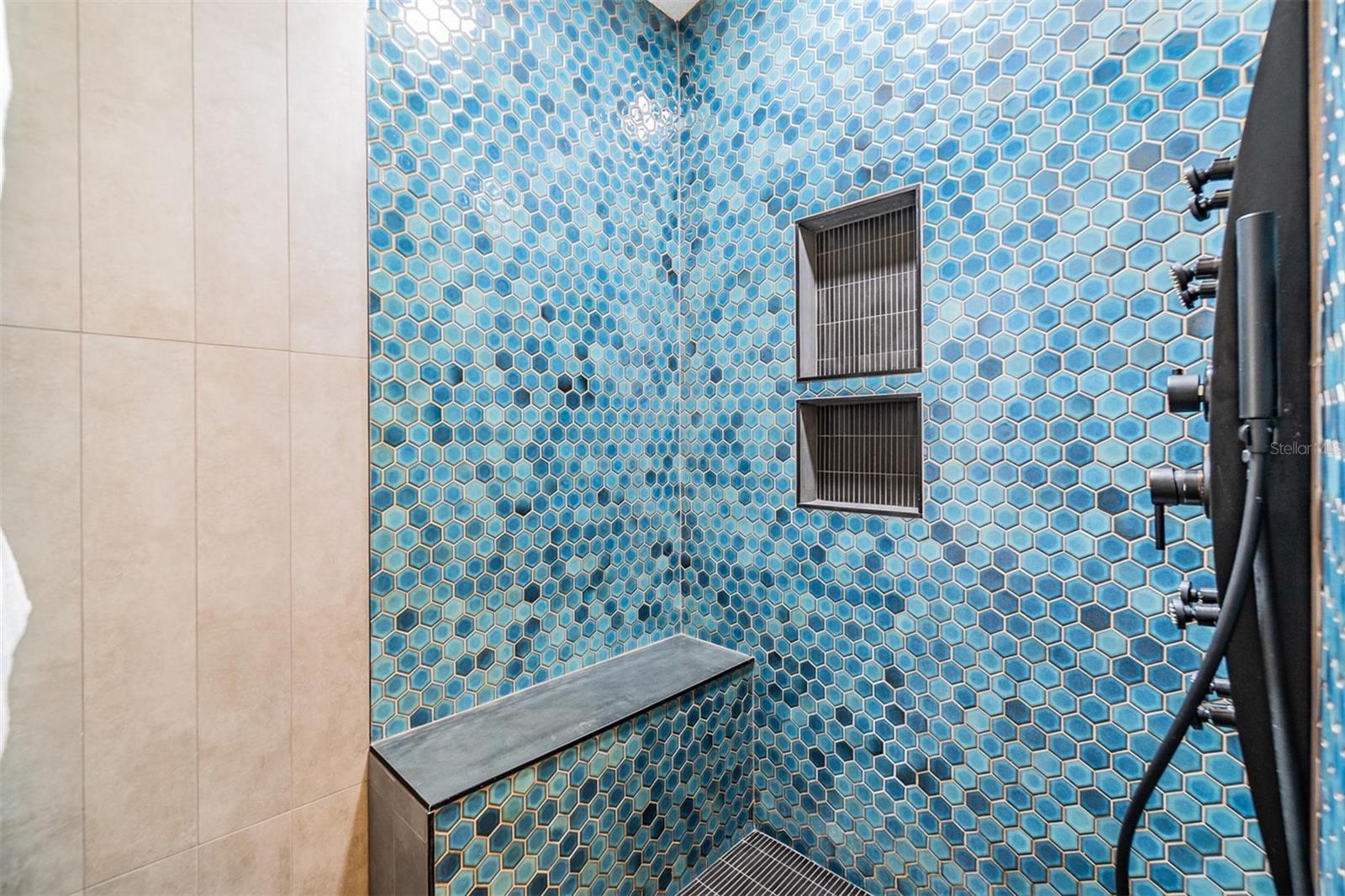 Primary bedroom shower.