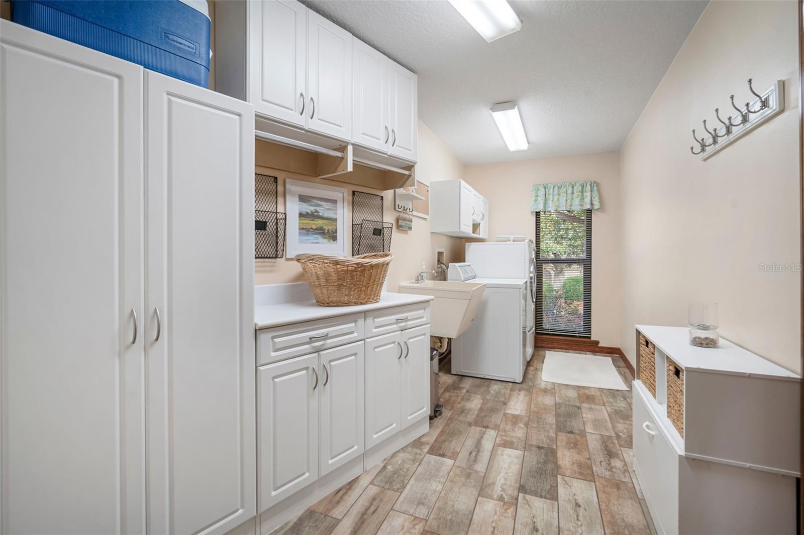 Laundry room with so much storage!