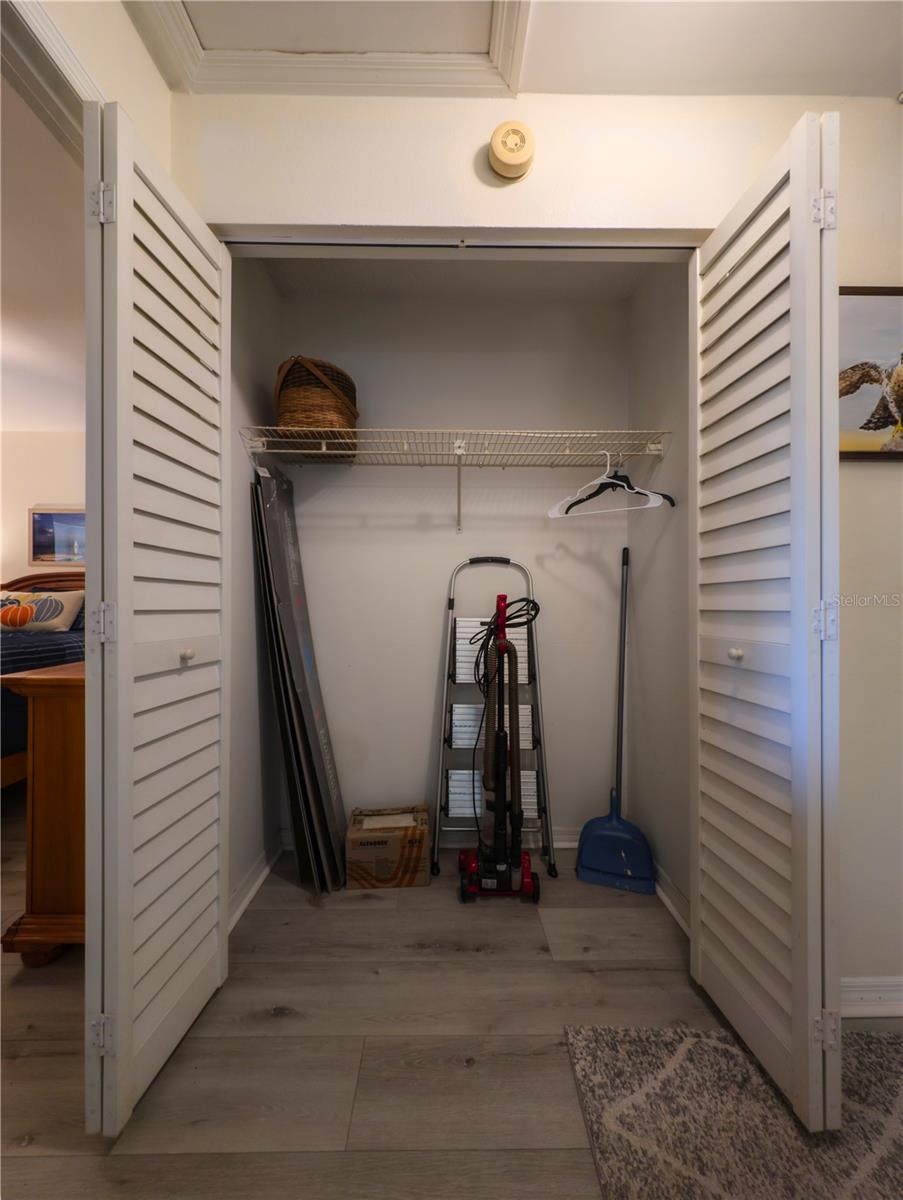 Closet space in hall! Plantation shutter doors