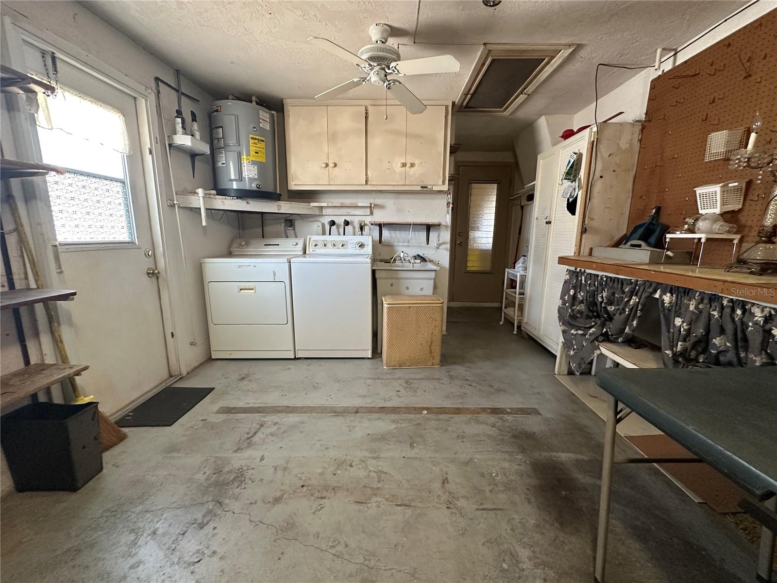Laundry area inside the garage