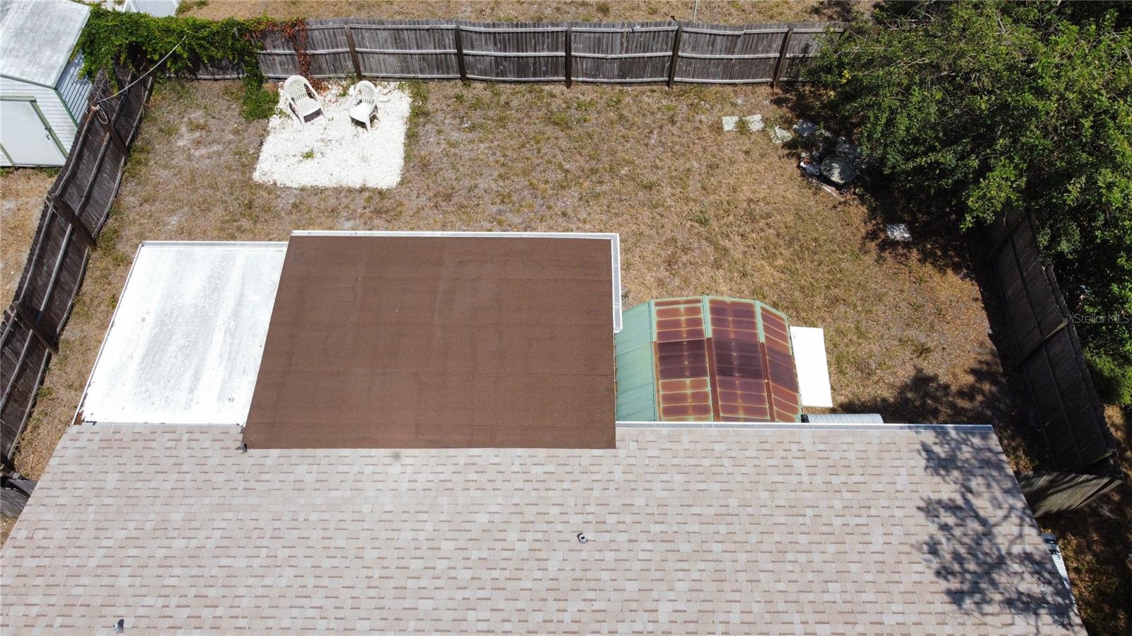 Aerial view showing the Newer installed roofs
