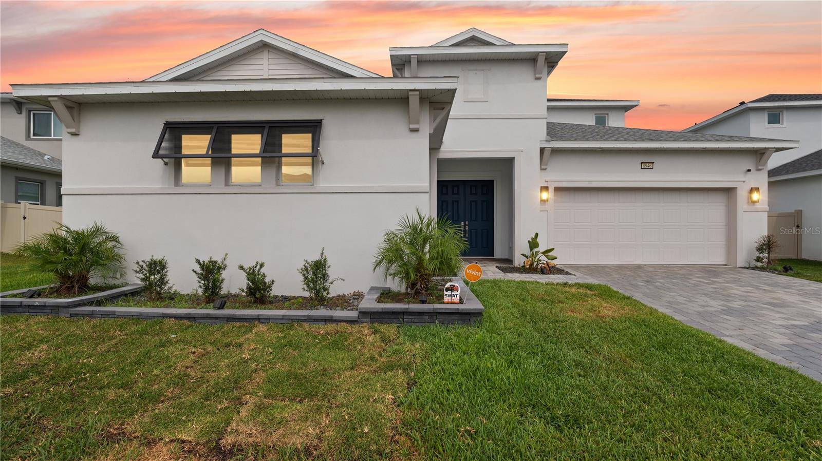 West Facing Home with Pavered Driveway. Courtyard Entry