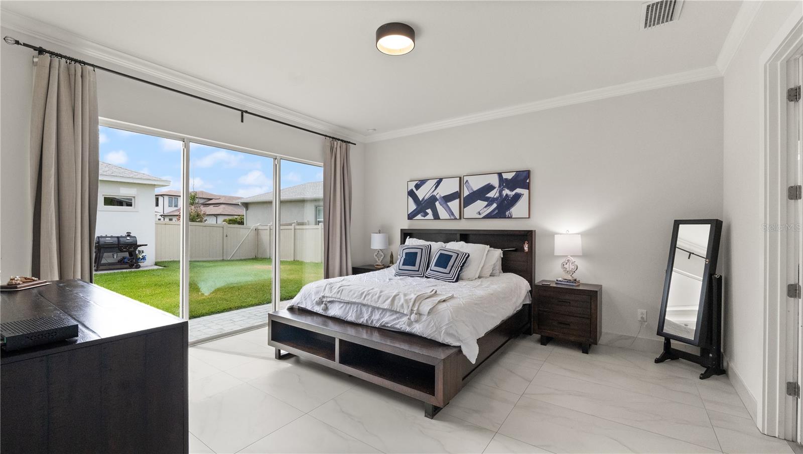 Primary Bedroom with Courtyard Views