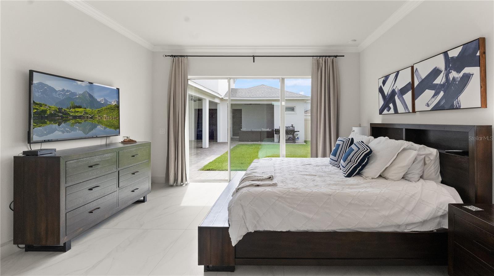 Primary Bedroom with Courtyard Views