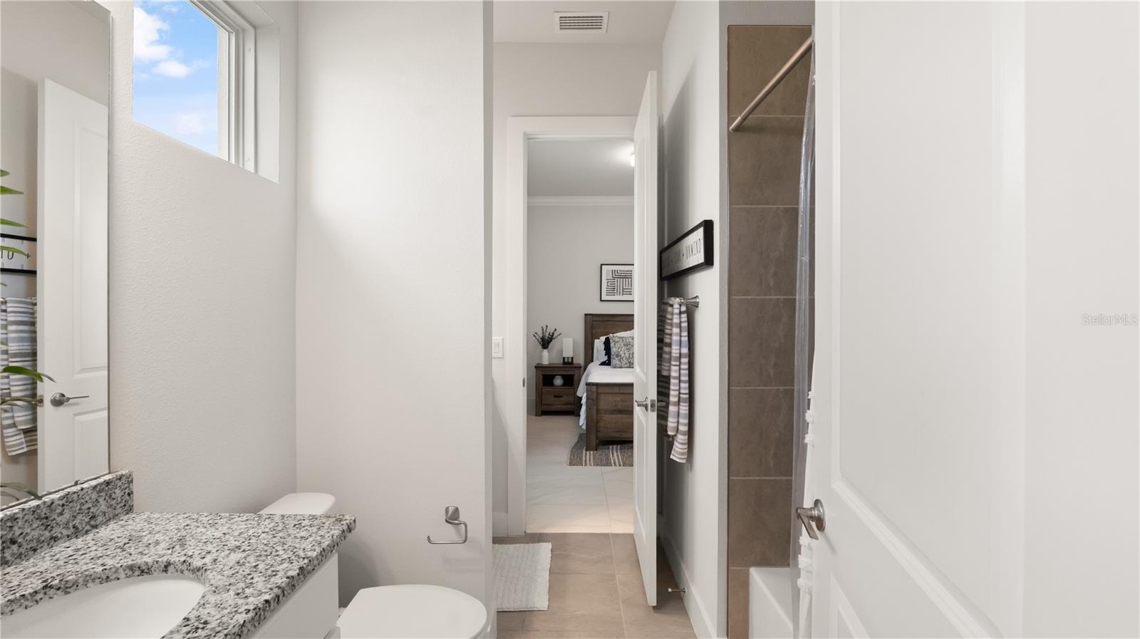 Jack & Jill Bath with Dual Sinks and Tub Shower