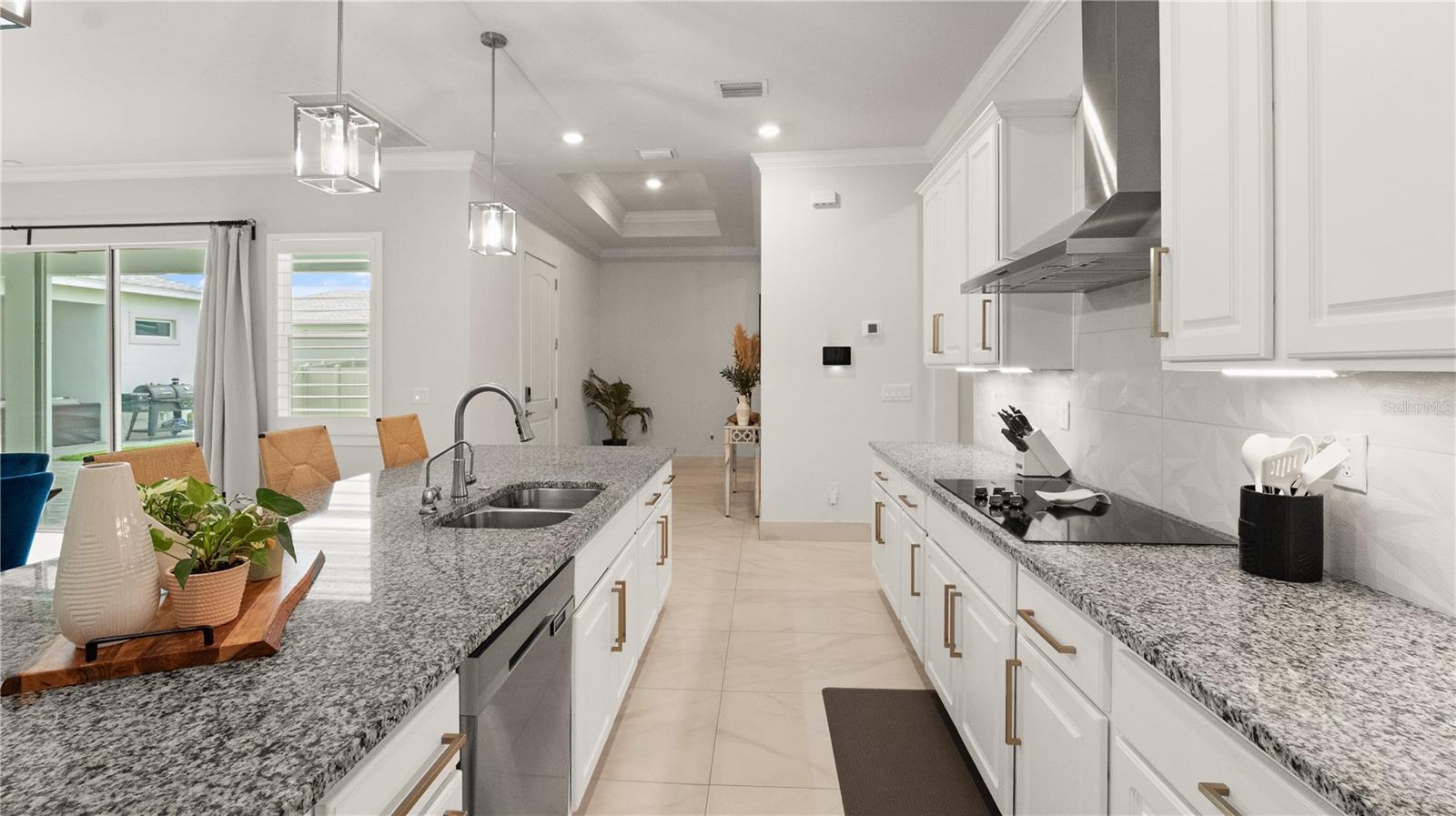 Gorgeous Kitchen with Large Island, Granit Counters, Upgraded Hardware, Stainless Steel Appliances, Crown Molding Cabinets and Closet Pantry