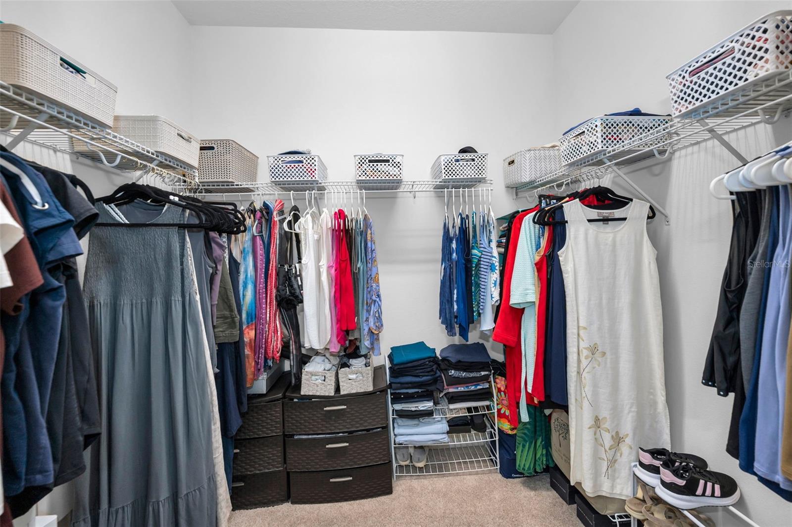 Primary Suite walk in closet