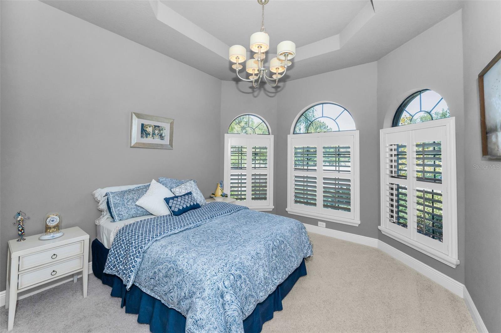 Bedroom #2 - plantation shutters on impact rated windows