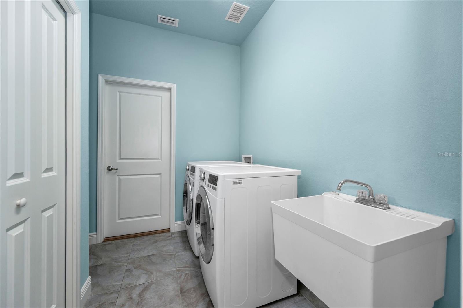 Laundry room - washer and dryer included - storage closet or 2nd pantry
