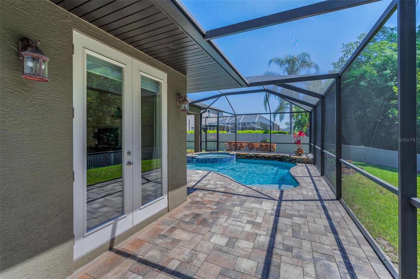 Extended lanai - French doors to primary suite