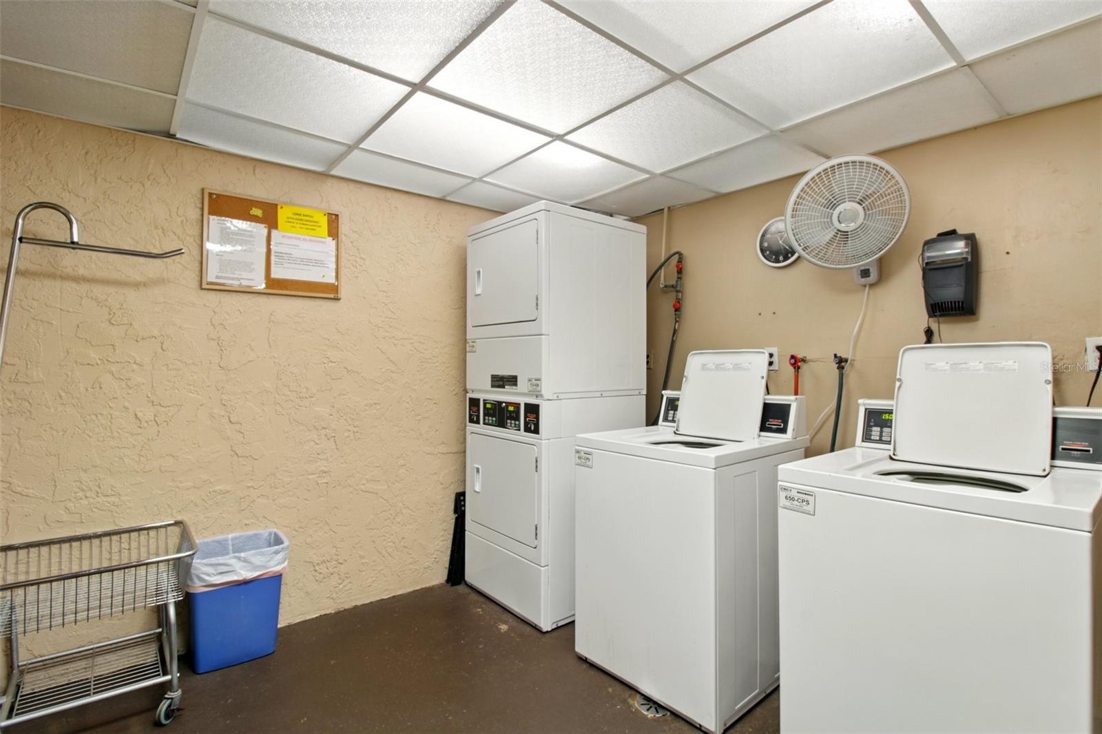 Ground floor laundry; covered corridor access