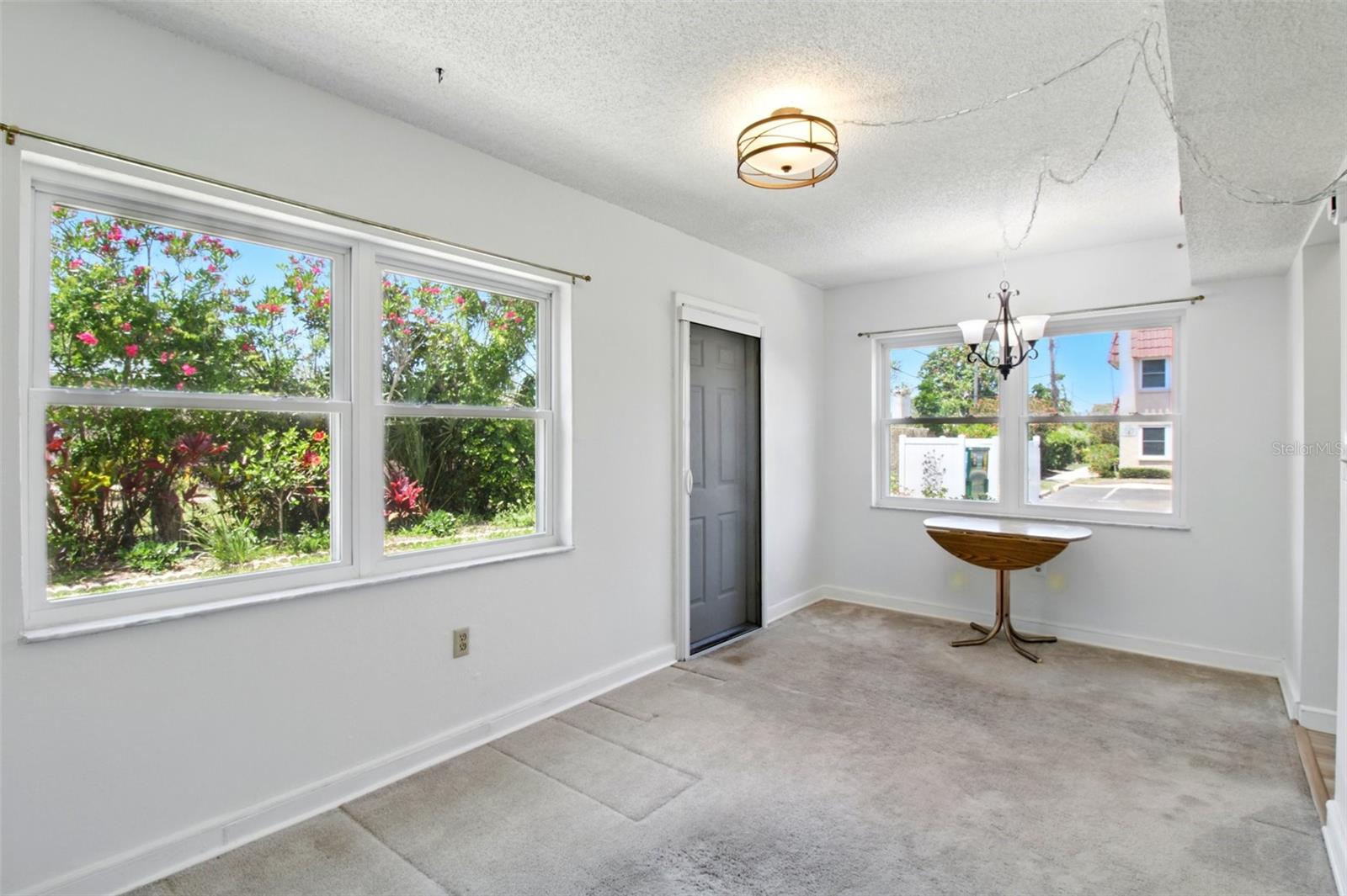 Bonus room at rear of unit; private back door access