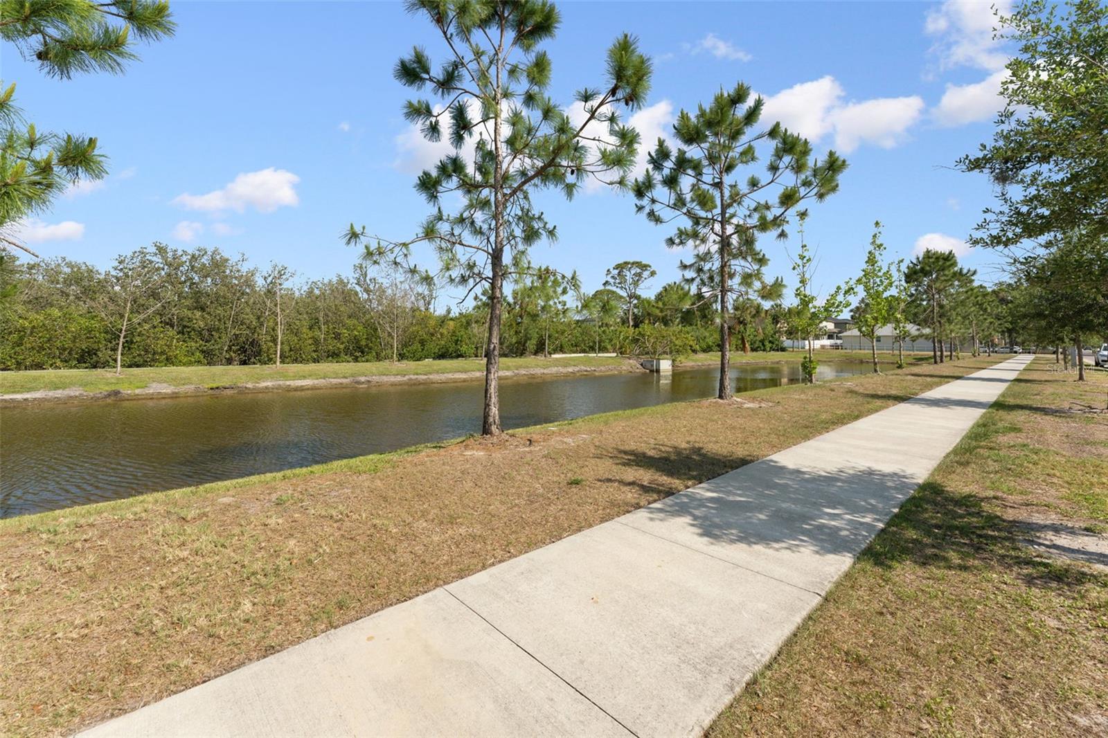 Serene pond view and walking trail