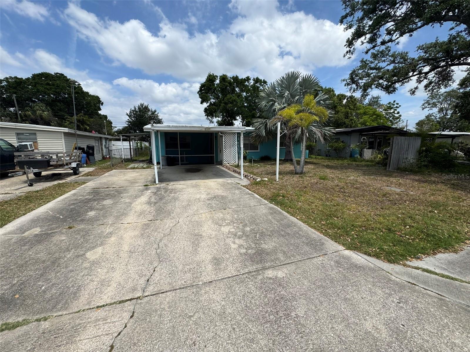 Front of Home including Car Port