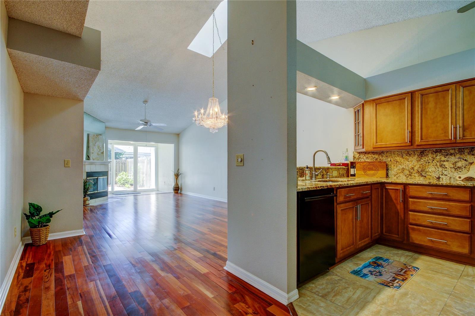 22. Upon Entering, to the LEFT .. Your Gorgeous Kitchen, Flows Seamlessly into a Vaulted Ceiling Great Room (12.9' x 23.3')!!