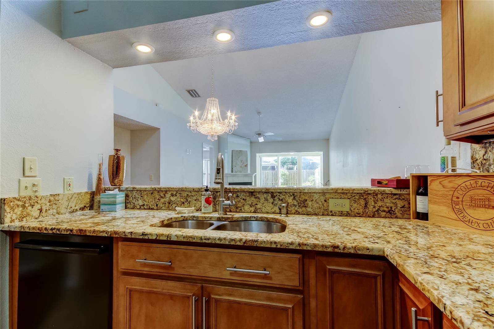 28. Onlook the Action in the Great Room (12.9' x 23.3') Via the Oversized Opening, Doubling as a Breakfast Bar!!