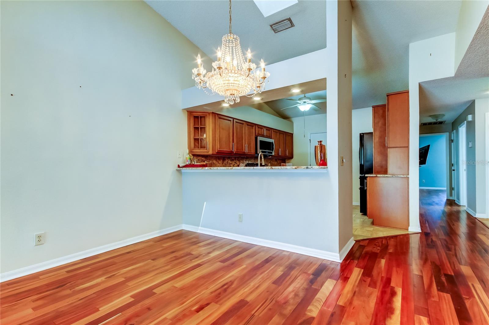 31. Dining Area (8.2 x 14.6') Allows Sizeable Table for Dinner Parties if You Wish! Vault Above w Skylights Feels More Spacious!