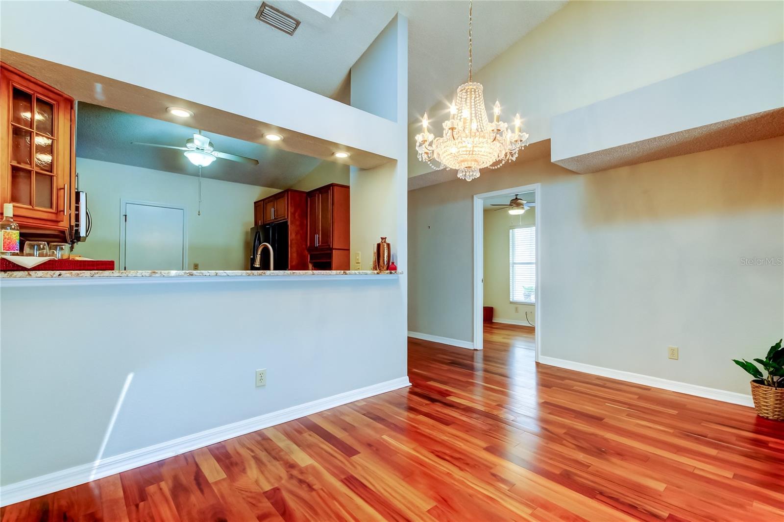 32. Dining Area (8.2 x 14.6') Just Off the Kitchen with a Large Serving Window Doubling as a Breakfast Bar! 32. Dining Area (8.2 x 14.6') Just Off the Kitchen with a Large Serving Window Doubling as a Breakfast Bar!