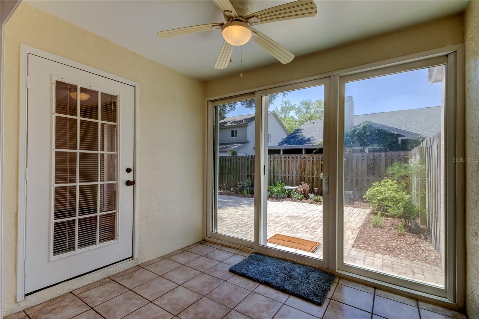 39. Mbedroom w Door Adjoining  to Climate Controlled Bonus Area (8.1 x 9.11') w Impact Sliders + GREAT View of Backyard!
