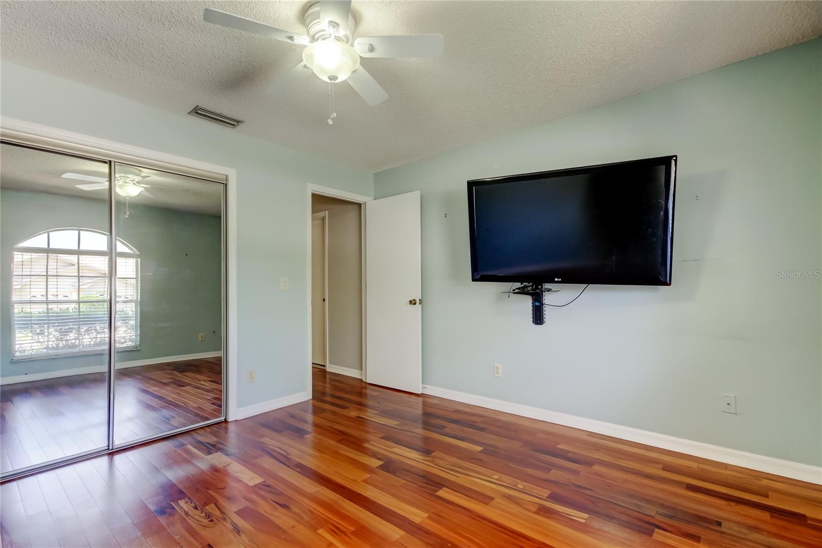 50. Bedroom #2 (11.1 x 11.1') is at Front of Home, Mounted Smart TV is Included!