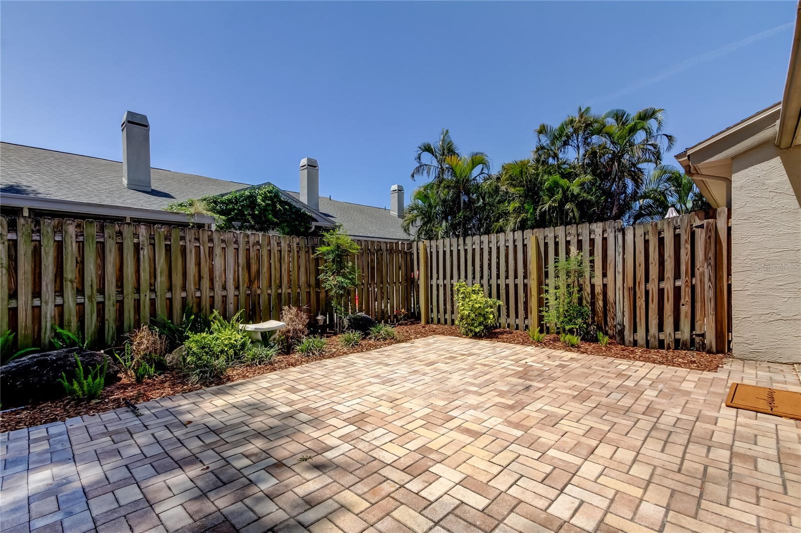 7a. EXTRA Large Backyard w Pavered Area, Gardening Area, Gate to Side of Home.. End Units Have Their Value Add Ons!!