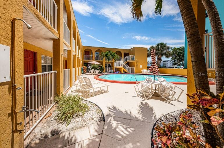LEAVING THE POOL AREA TO WALK TO THE SUNDECK AND BEACH