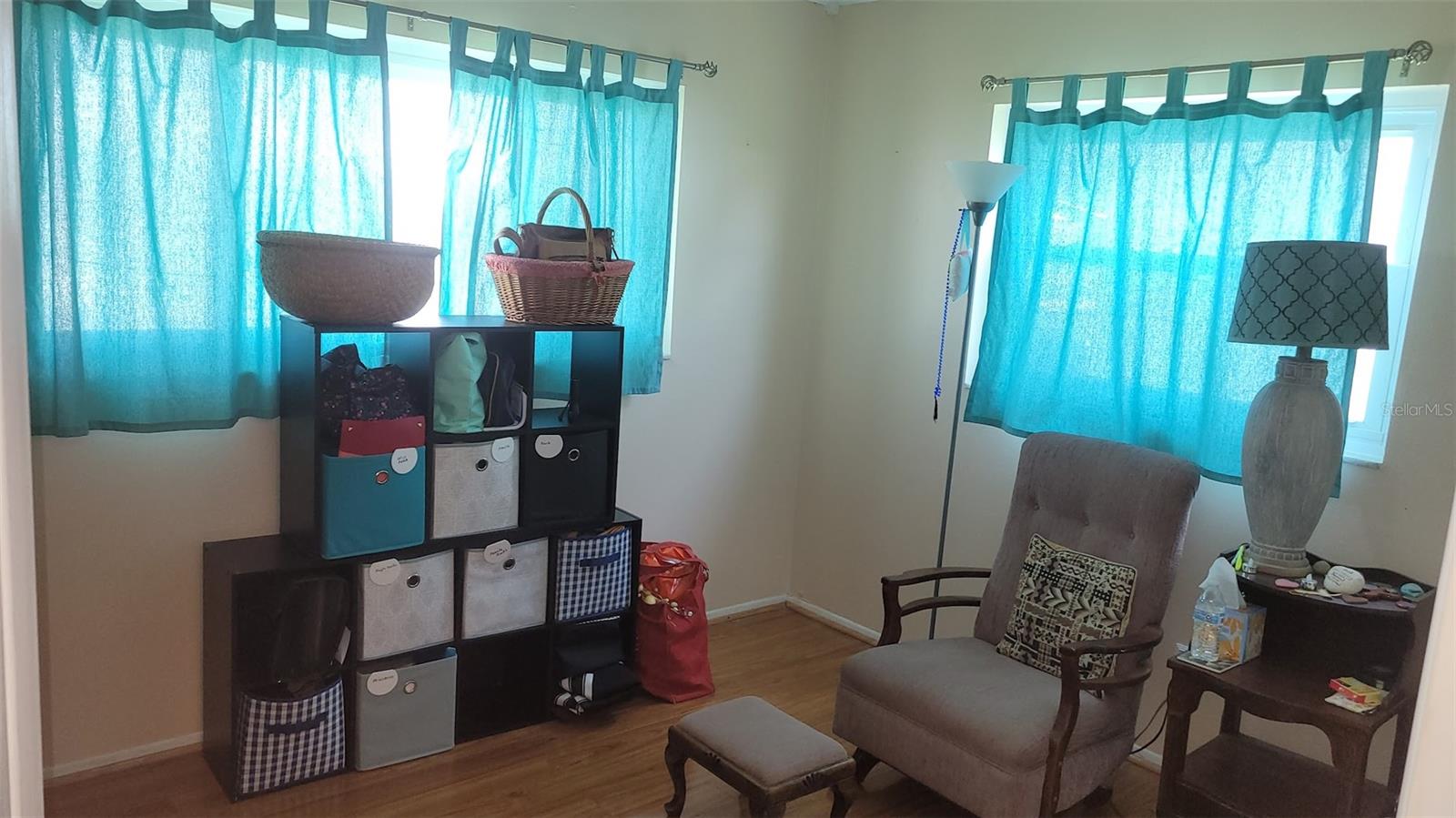 The 2nd Bedroom is currently a room to relax in and a place holder for the items that will be moving to a new location. The room is 10X10.