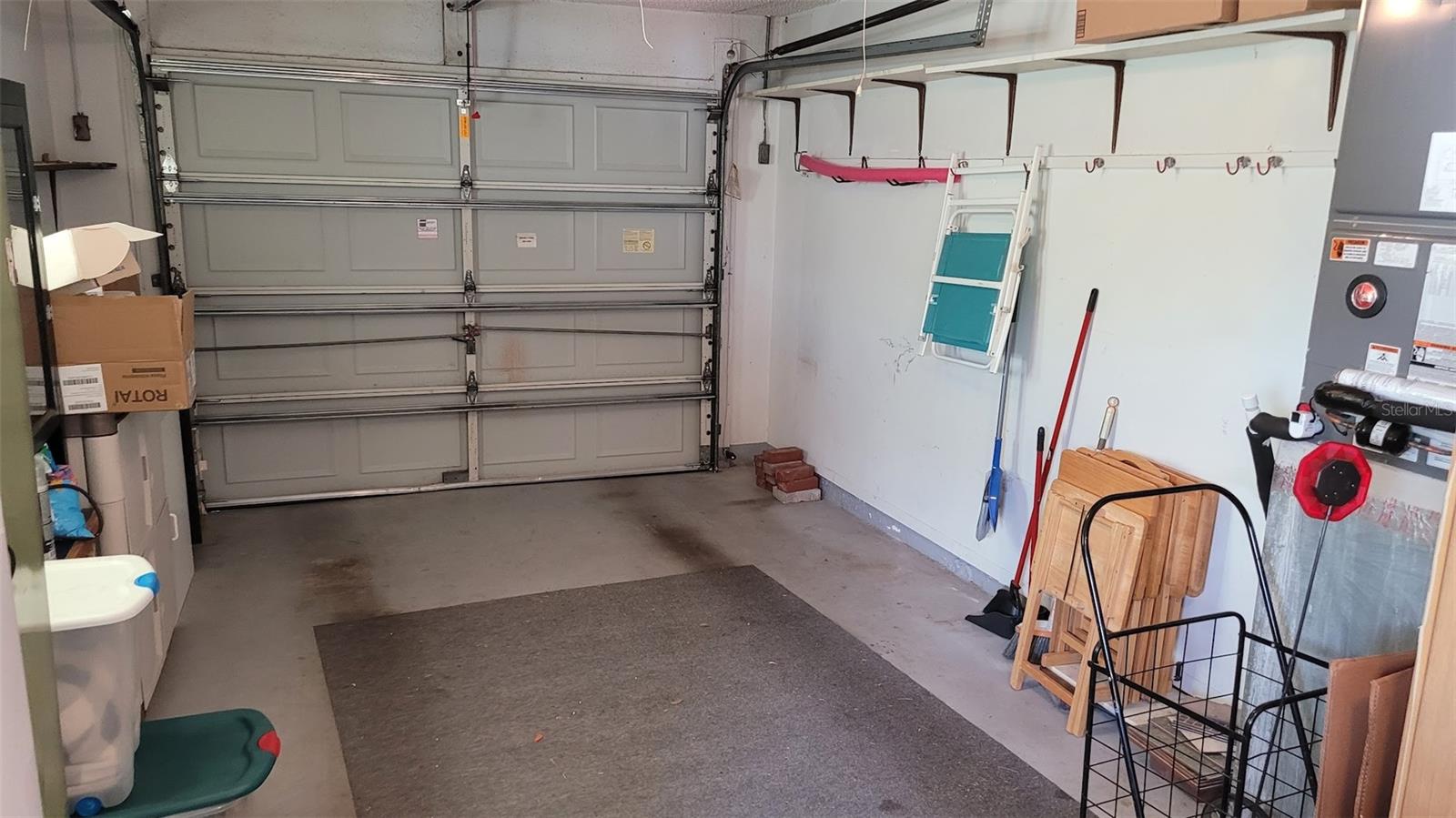 The garage from the side by the laundry.
