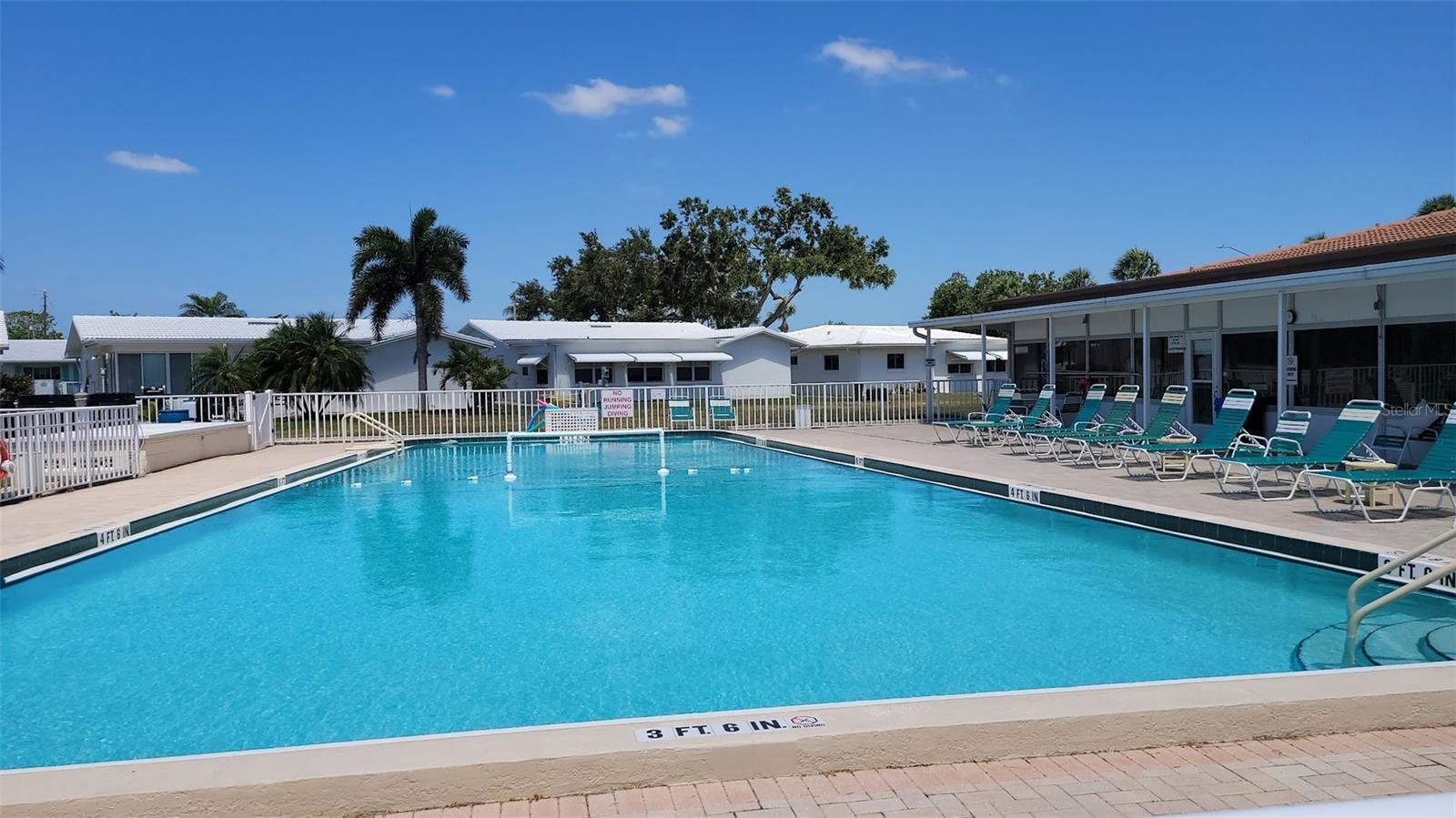 The large pool offers wonderful opportunities for visiting with friends, swimming laps, sunbathing, or curling up in the shaded areas with a good book.