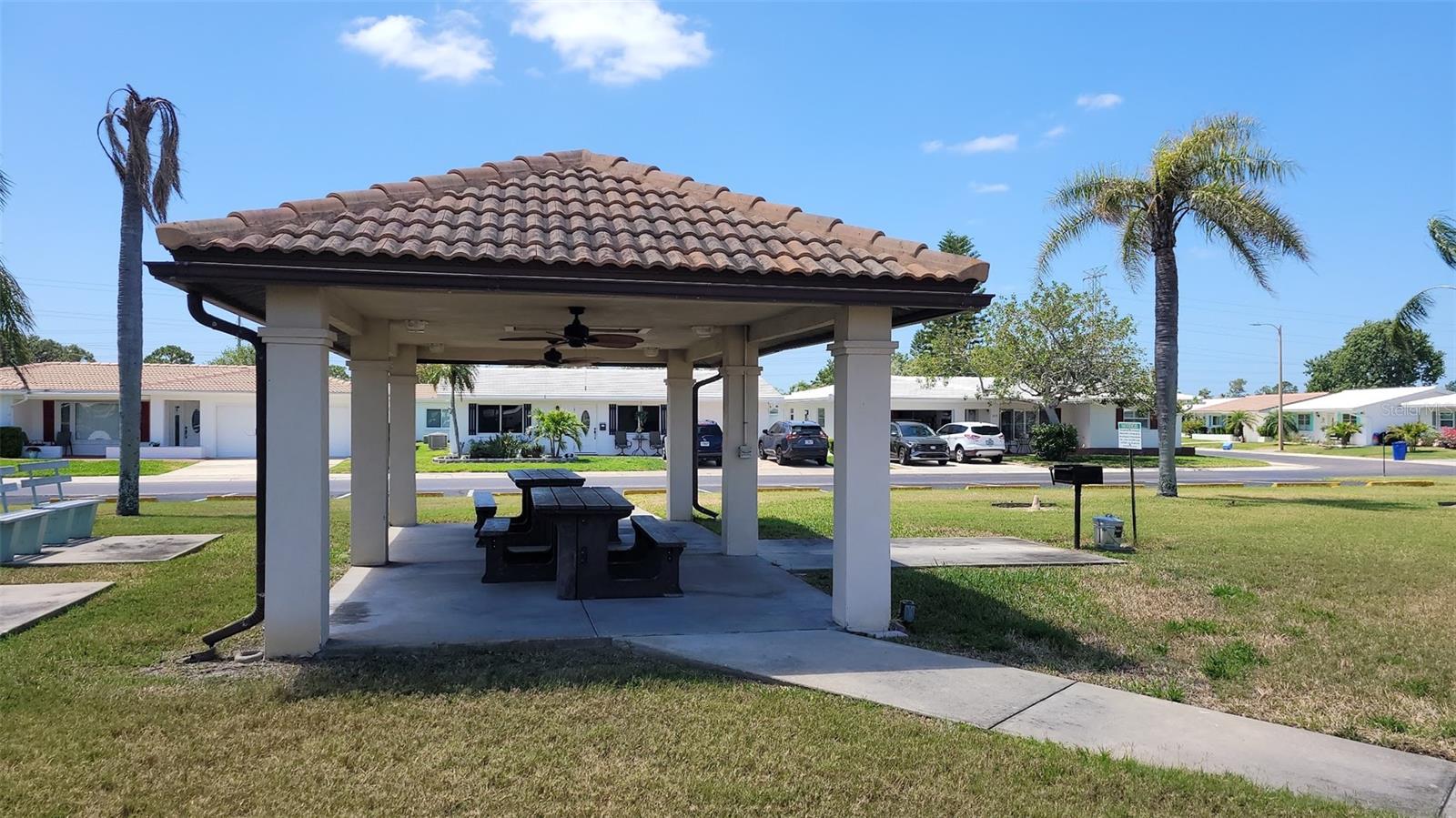 Unit 4 has a picnic shelter and grill area to be enjoyed.