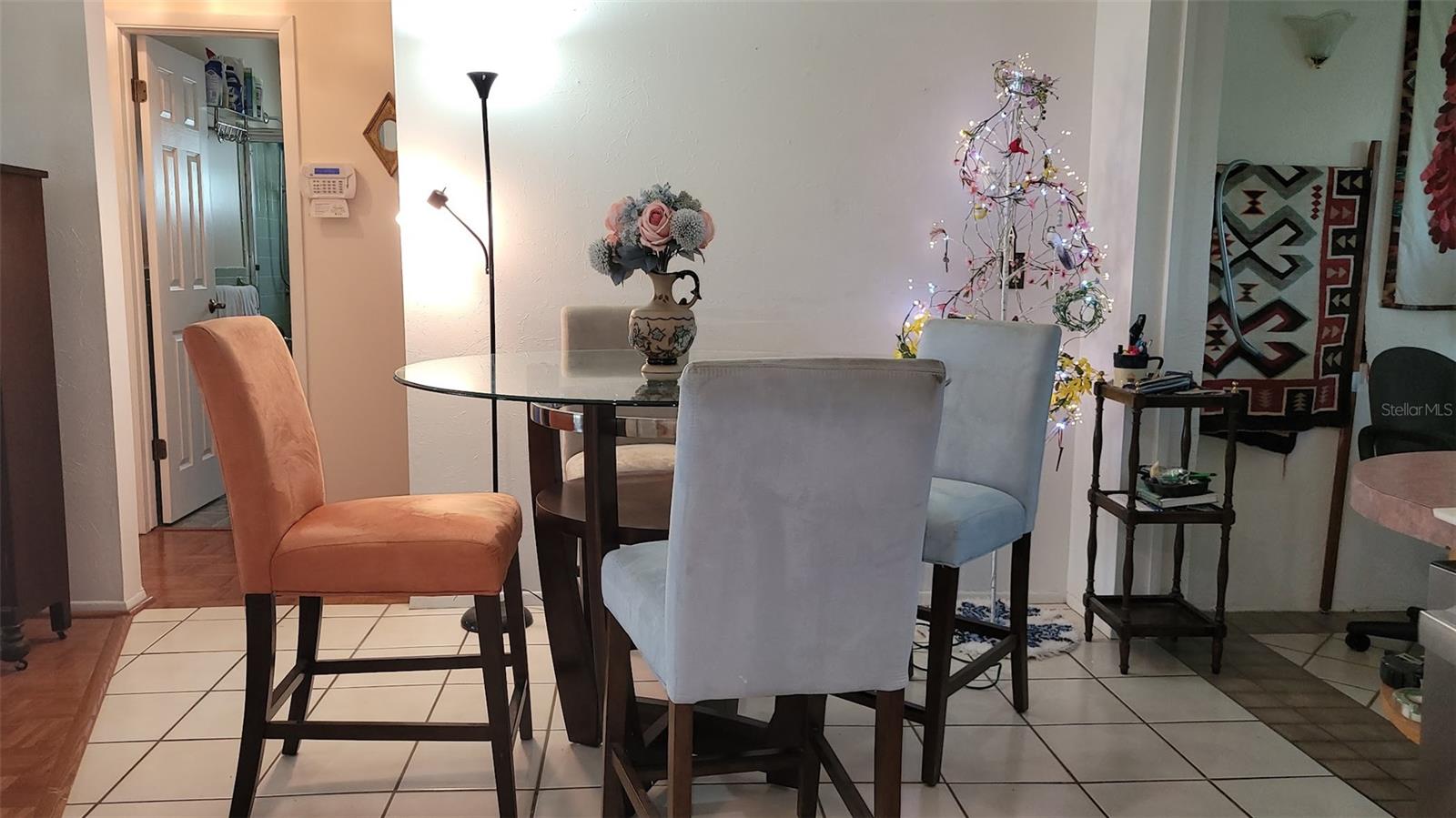 The Dining Area is in between the Living Room and Family Room, conveniently off the kitchen.