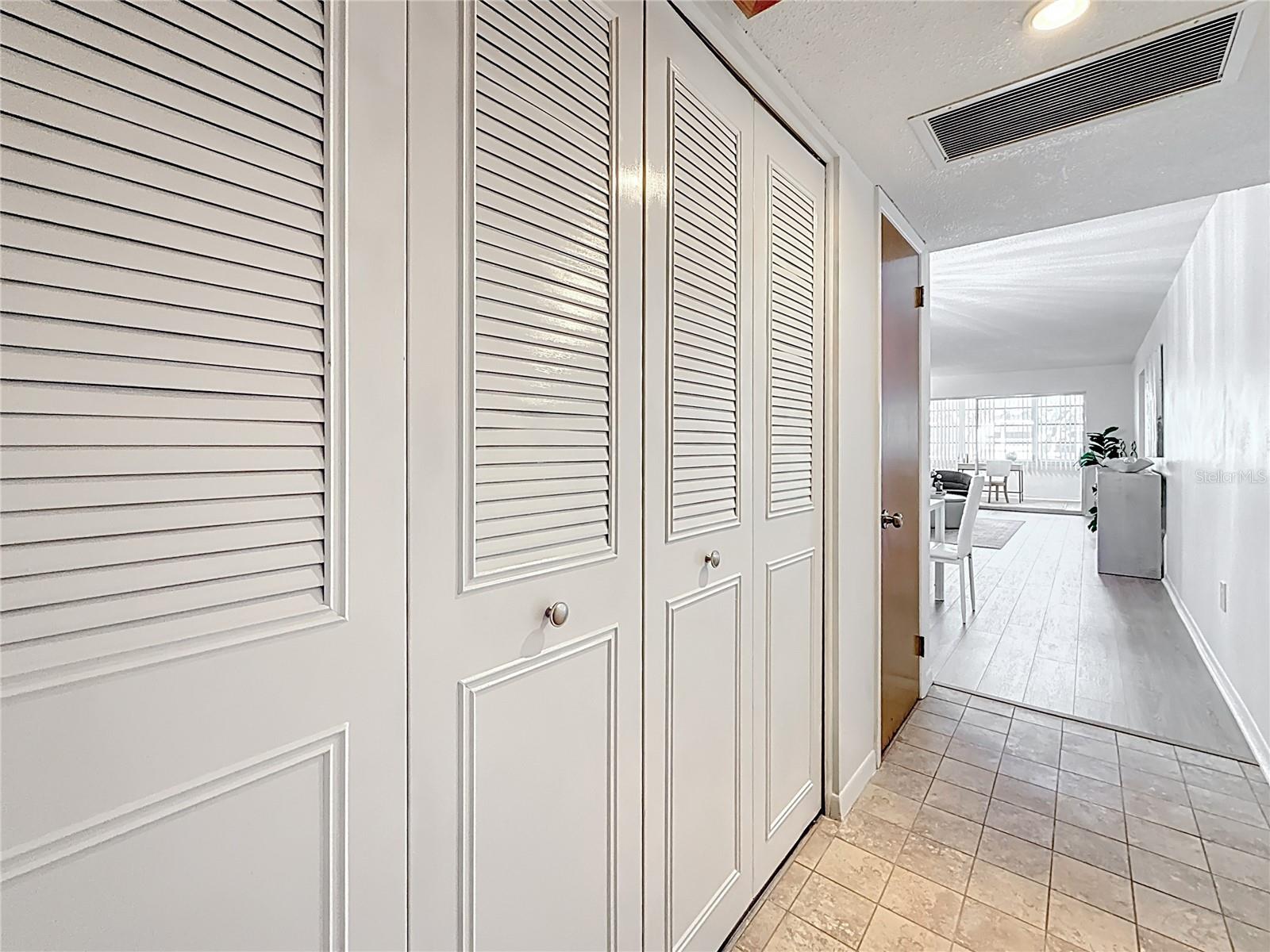 Additional closet space is an the entrance.