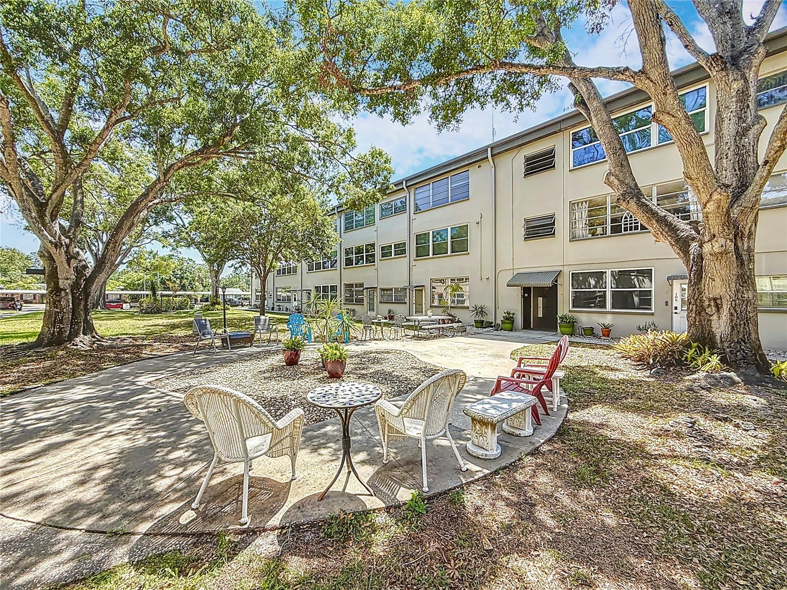 The large tree shaded courtyard is a favorite place for relaxing and visiting with neighbours