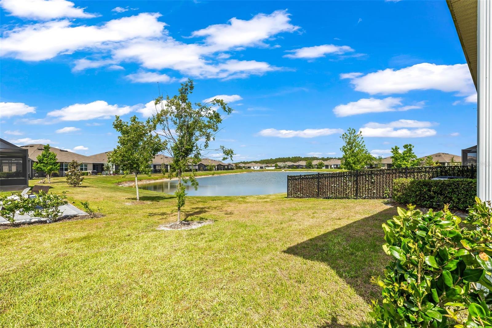 Pond views accent the back of the home.