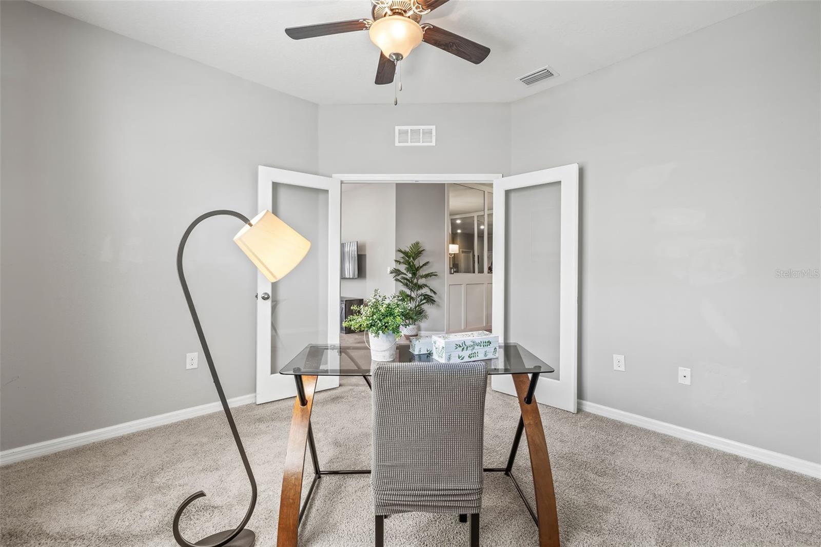 2nd bedroom is dually used as a flex space or office with walk in closet, and double glass doors.