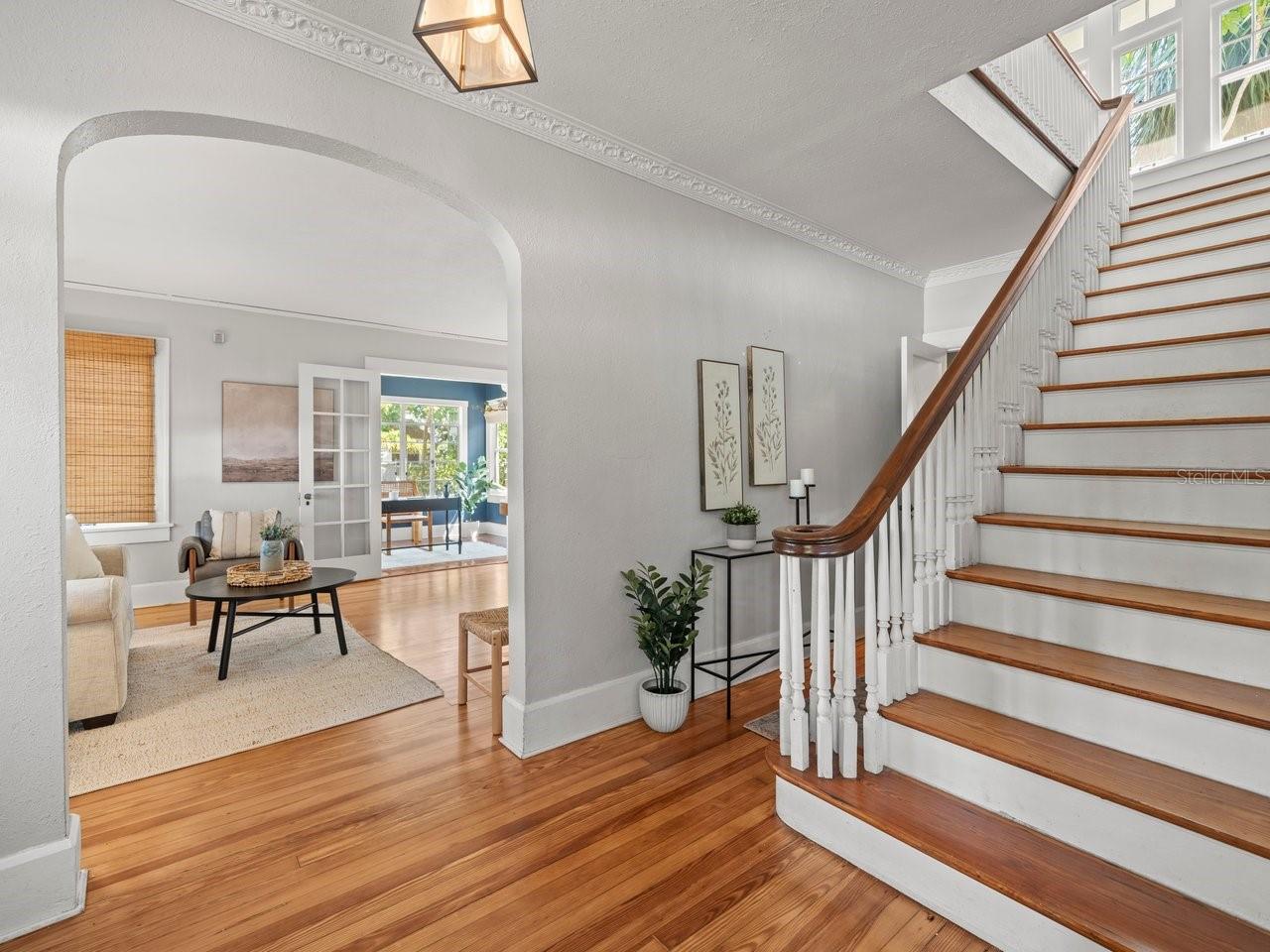 Gleaming original refinished woodflooring.