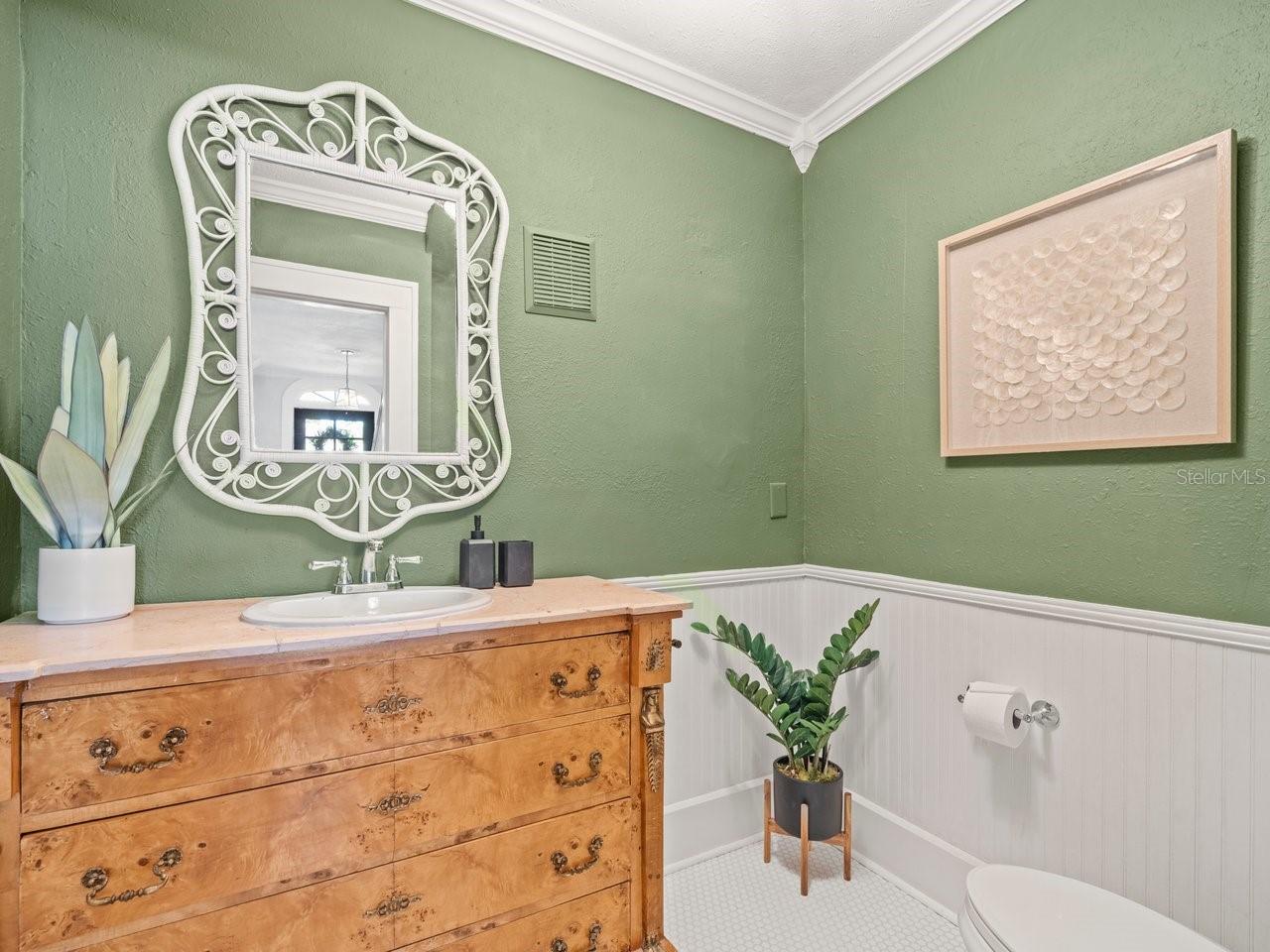Sylish powder room off living area.