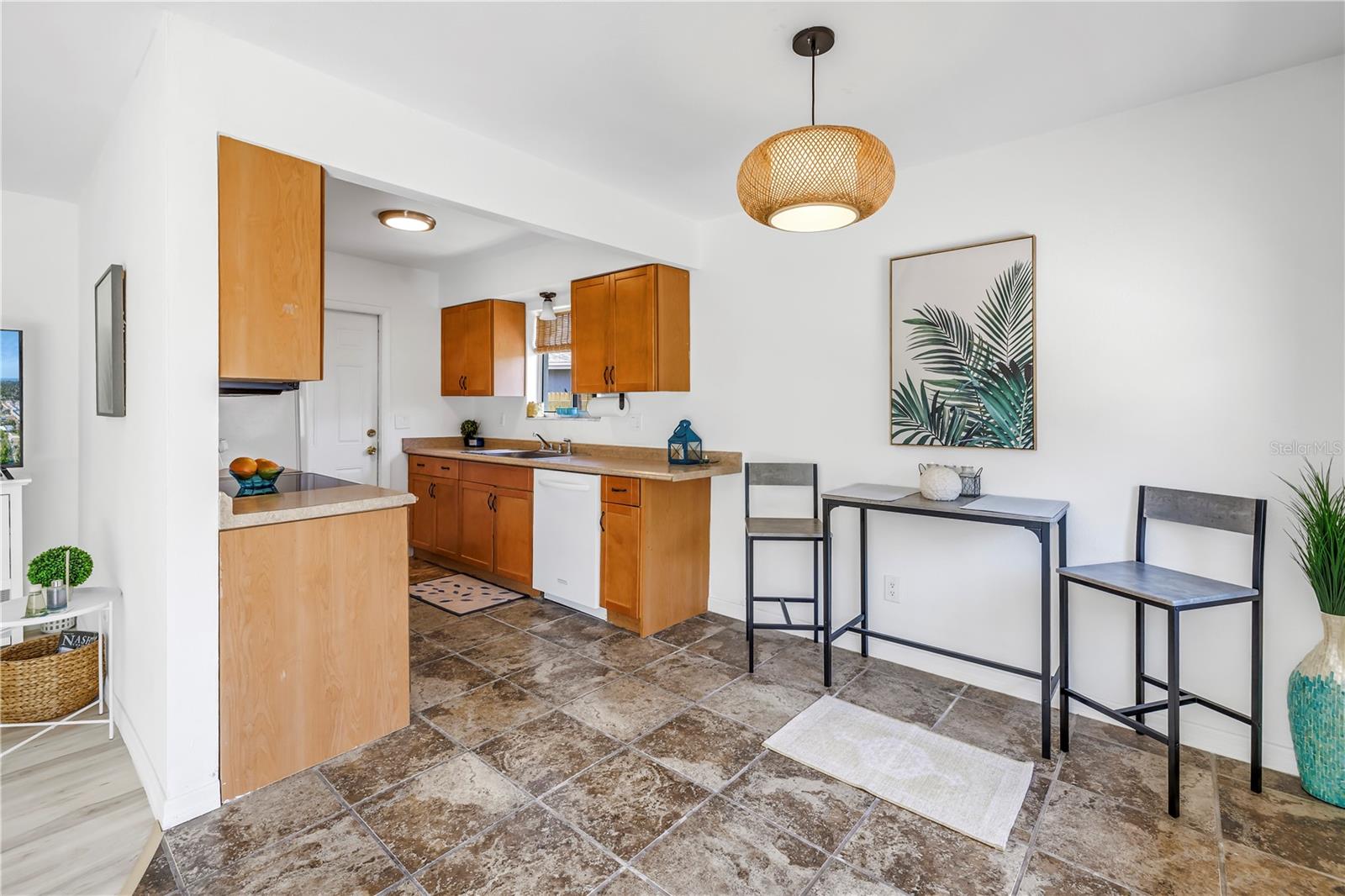 Dining room and kitchen.