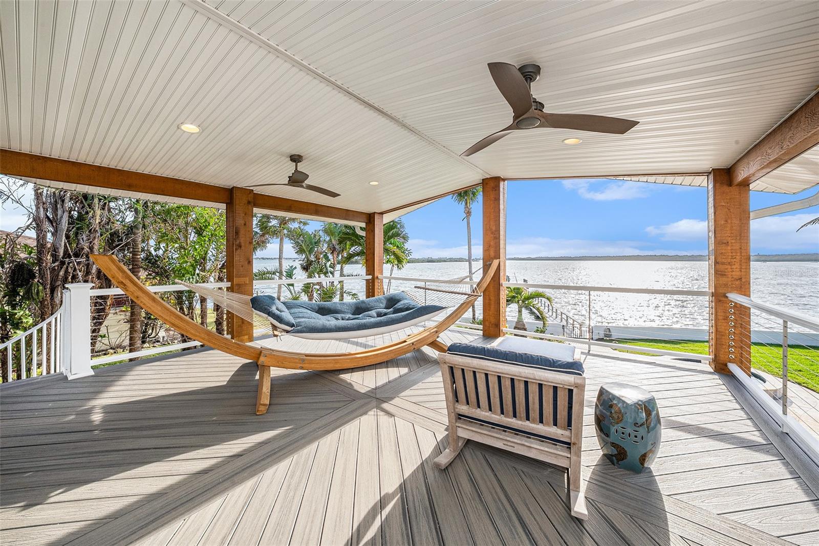 Covered Lanai off Primary Suite w/spiral staircase
