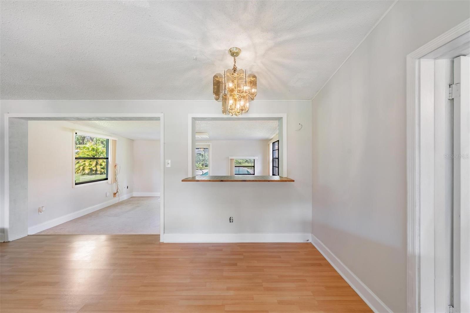 Dining room with passthrough to family room
